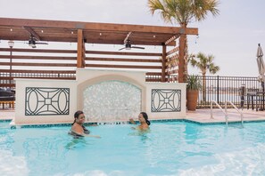 Outdoor pool, open 9:00 AM to 10:00 PM, free cabanas, pool umbrellas