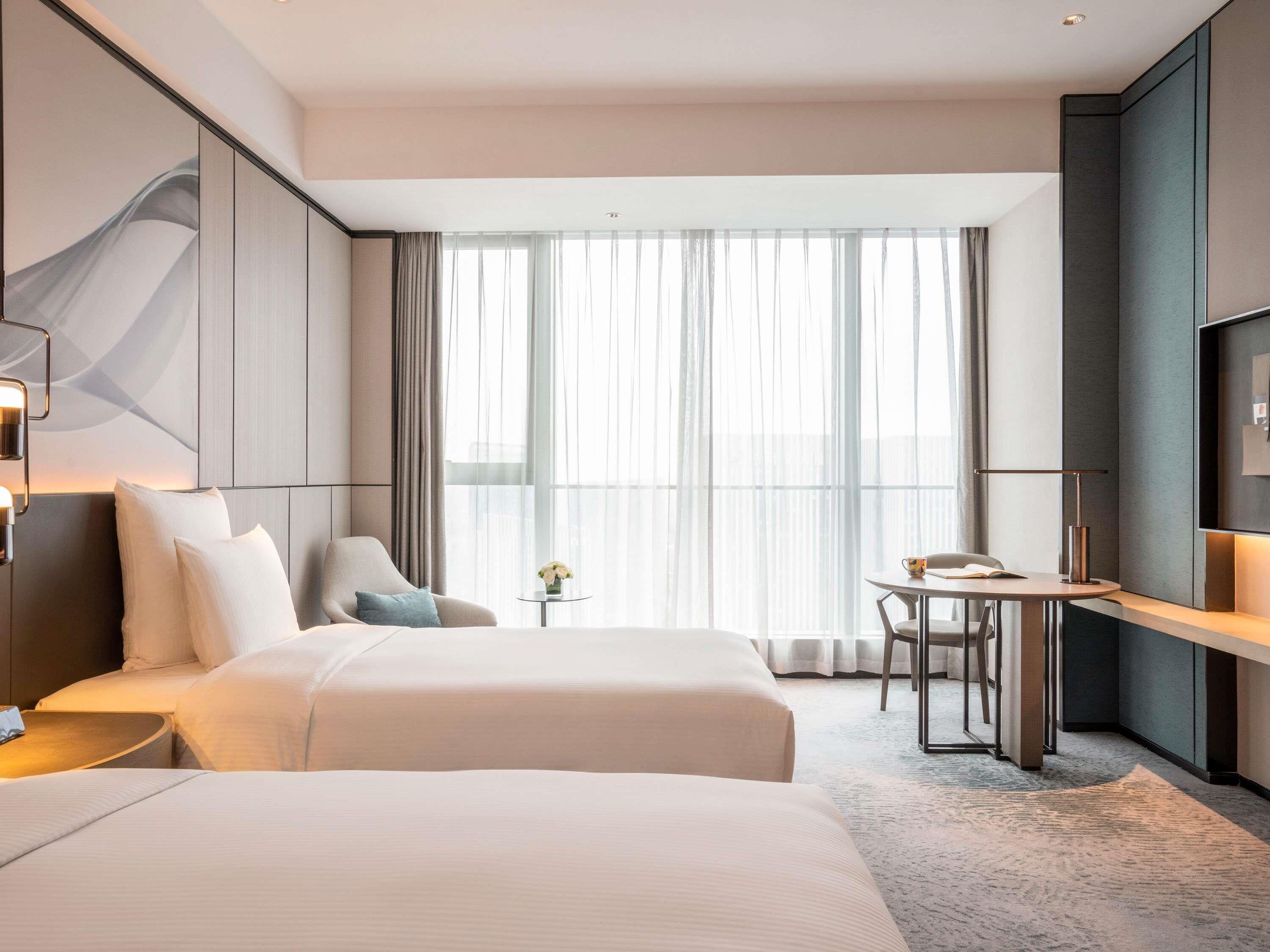 Couette en duvet d'oie, coffres-forts dans les chambres, bureau