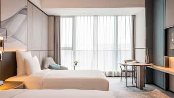Couette en duvet d'oie, coffres-forts dans les chambres, bureau