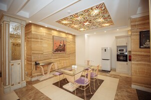 Deluxe Apartment, 2 Bedrooms | Private kitchen | Full-size fridge, microwave, oven, stovetop