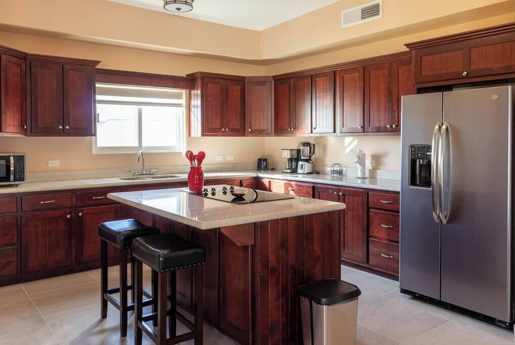 Fridge, microwave, stovetop, coffee/tea maker