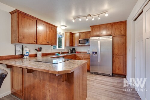 Duplex Home—5 Min Walk to Sanders Beach & Trails, Spacious Family Room, Just 1 Mile to Downtown!