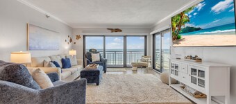 Top-floor direct oceanfront 2/2 with a private balcony, heated pool and beach access