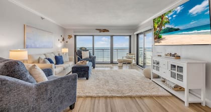 Top-floor direct oceanfront 2/2 with a private balcony, heated pool and beach access