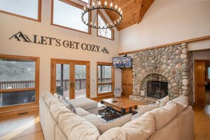 TV, fireplace, table football, books