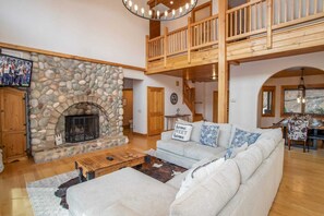 TV, fireplace, table football, books