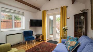 House (1 Bedroom) | Living room | TV