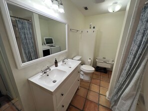 Combined shower/tub, hair dryer, towels, soap