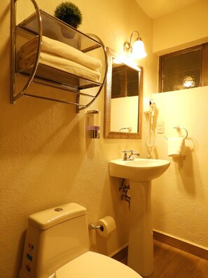 Bathtub, free toiletries, towels, soap