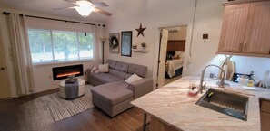 Smart TV, fireplace, DVD player, books