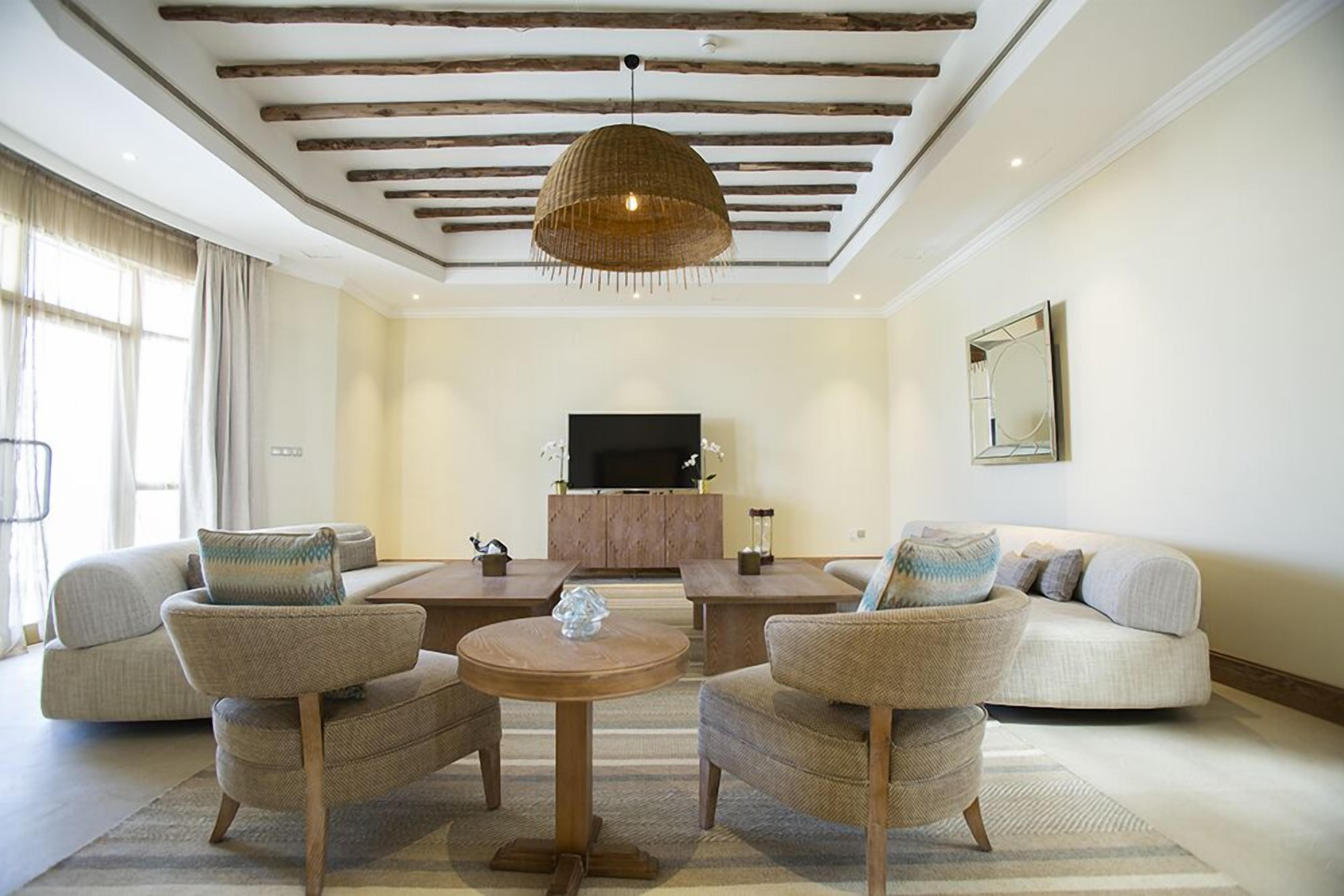 Villa | Living area | 32-inch flat-screen TV with satellite channels, TV
