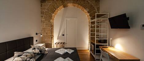 Habitación Deluxe | Ropa de cama de alta calidad, edredón y camas con efecto memoria