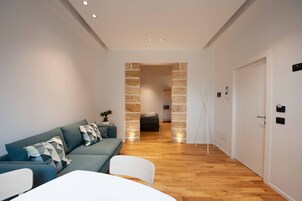 Deluxe Apartment, 1 Queen Bed, City View | Living area | LED TV