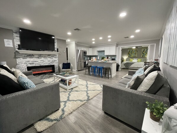 Smart TV, fireplace, books