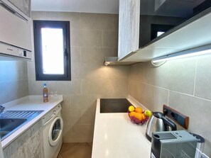 Fridge, microwave, dishwasher, coffee/tea maker