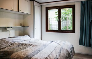 2 dormitorios, cuna de viaje, wifi y ropa de cama