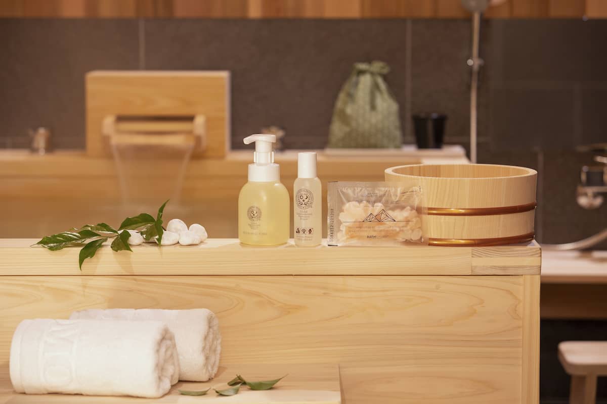 separate bathtub and shower, free toiletries, slippers, bidet