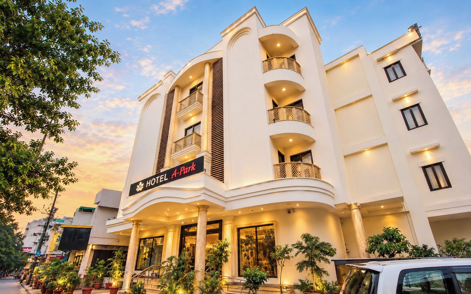 A multi-story hotel with a prominent sign reading 'HOTEL A-Park.'