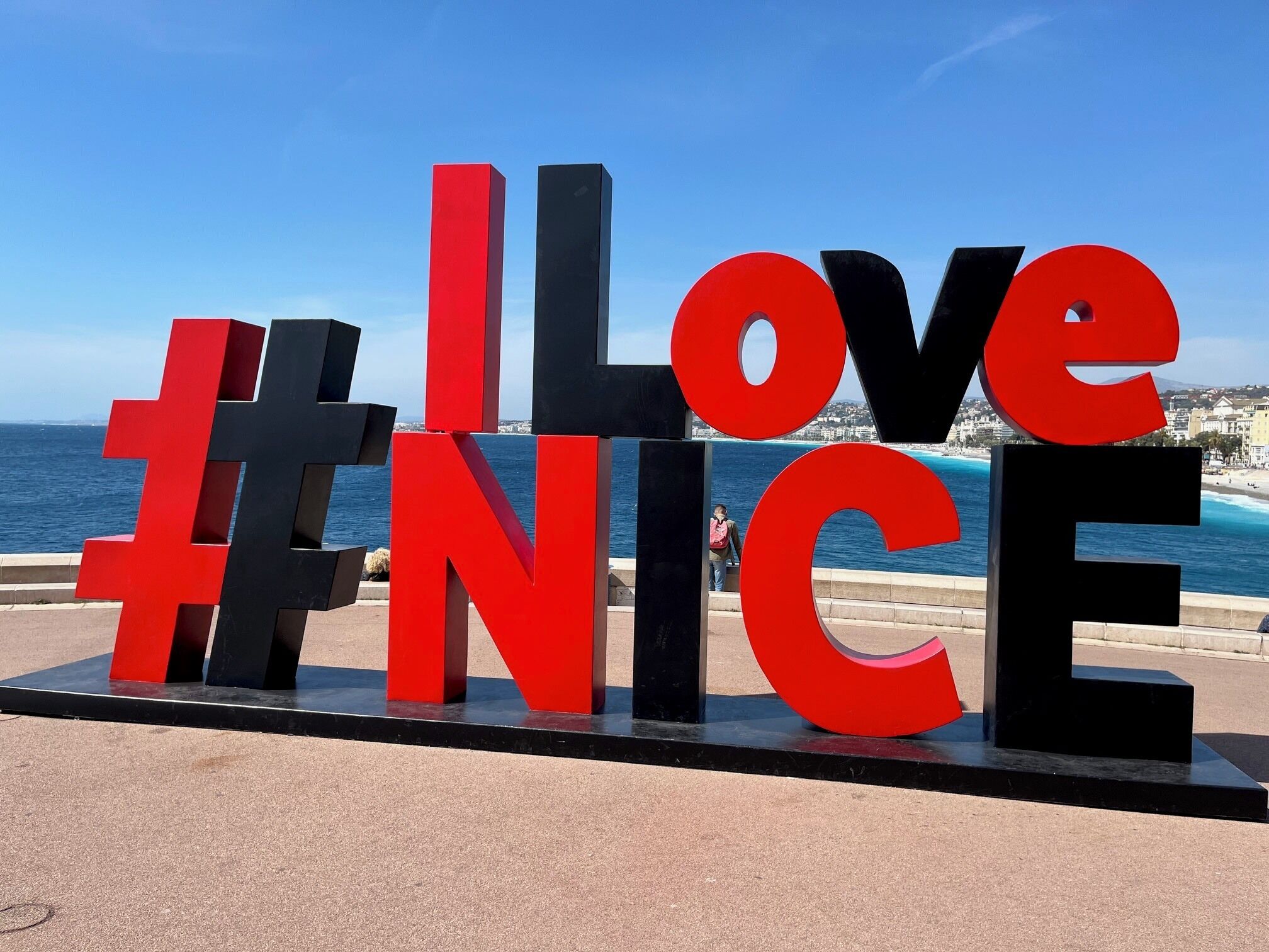 A large outdoor sign with the words 'I Love Nice' in bold red and black letters.
