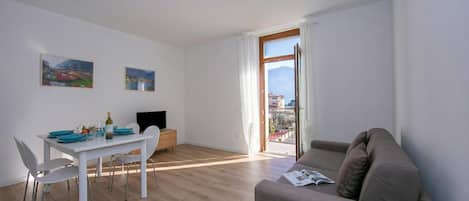 Familienapartment, Mehrere Schlafzimmer (Appartamento Verde) | Wohnbereich