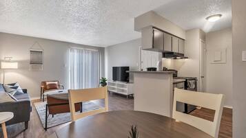 Apartment (1 Bedroom) | Living area | TV