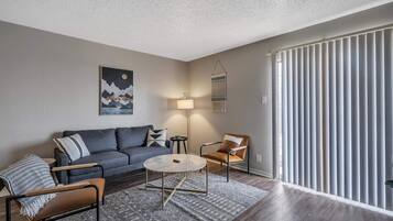 Apartment (1 Bedroom) | Living area | TV