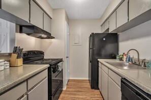 Apartment (1 Bedroom) | Private kitchen | Microwave, oven, stovetop, dishwasher
