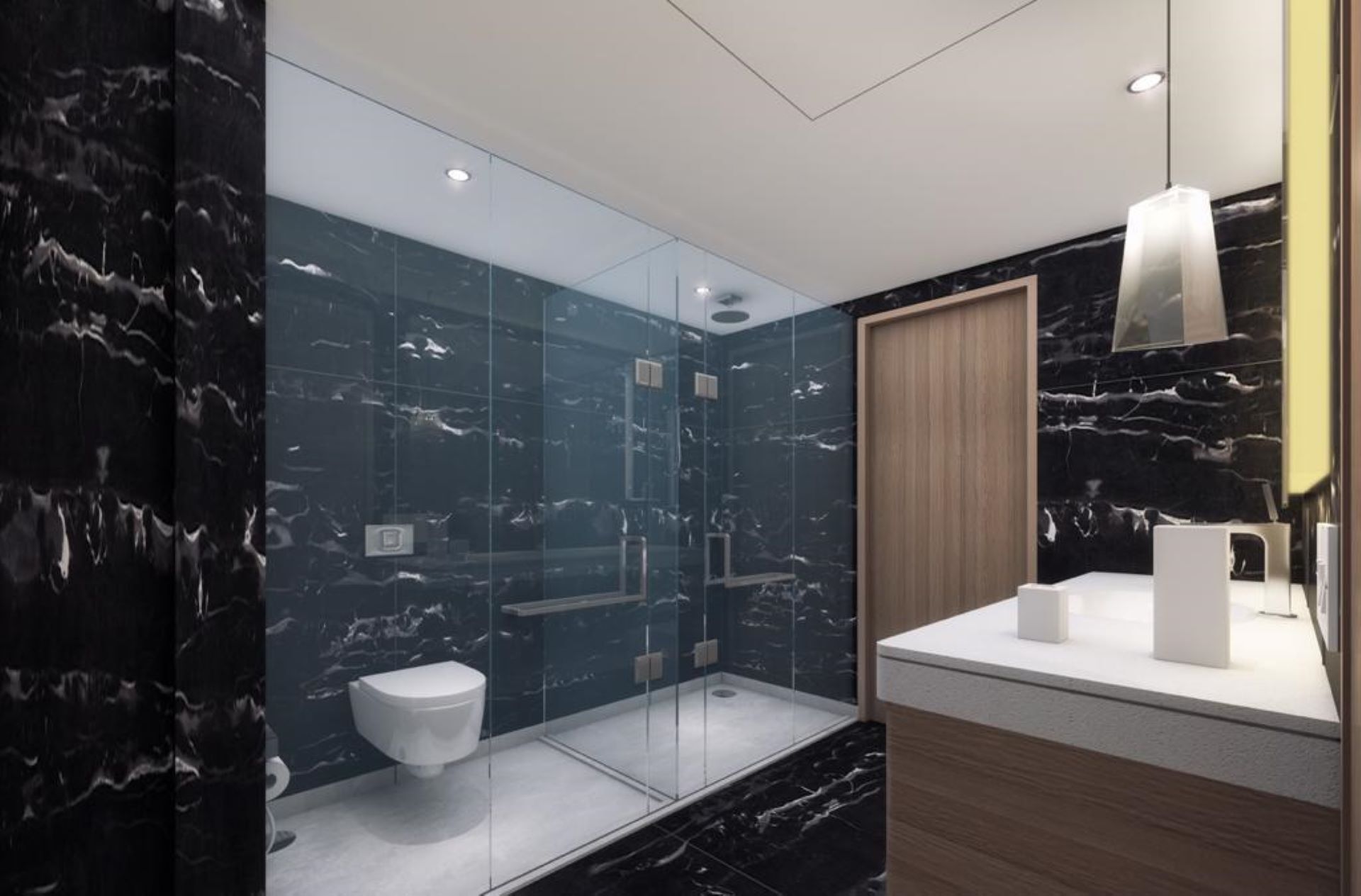 Un baño moderno con ducha envuelta en vidrio, inodoro blanco y tocador de madera con espejo.