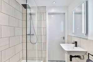Bathtub, hair dryer, towels