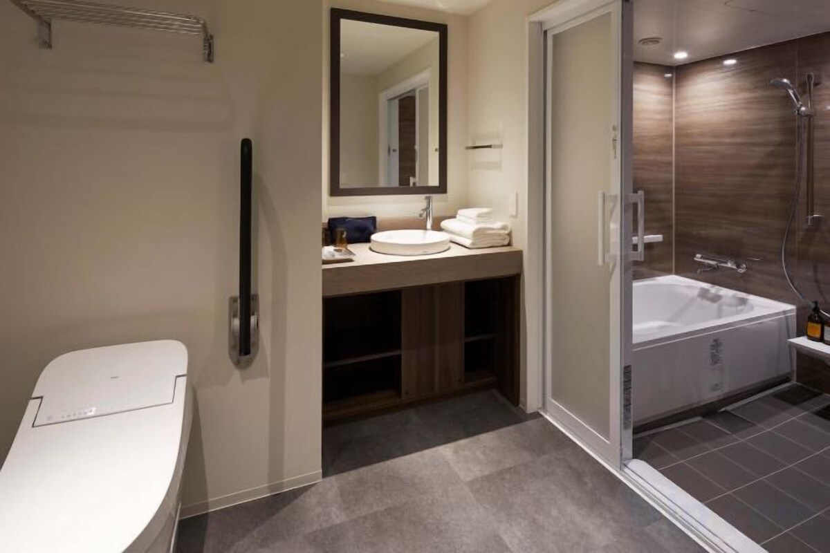 Bathroom | Free toiletries, hair dryer, slippers, electronic bidet