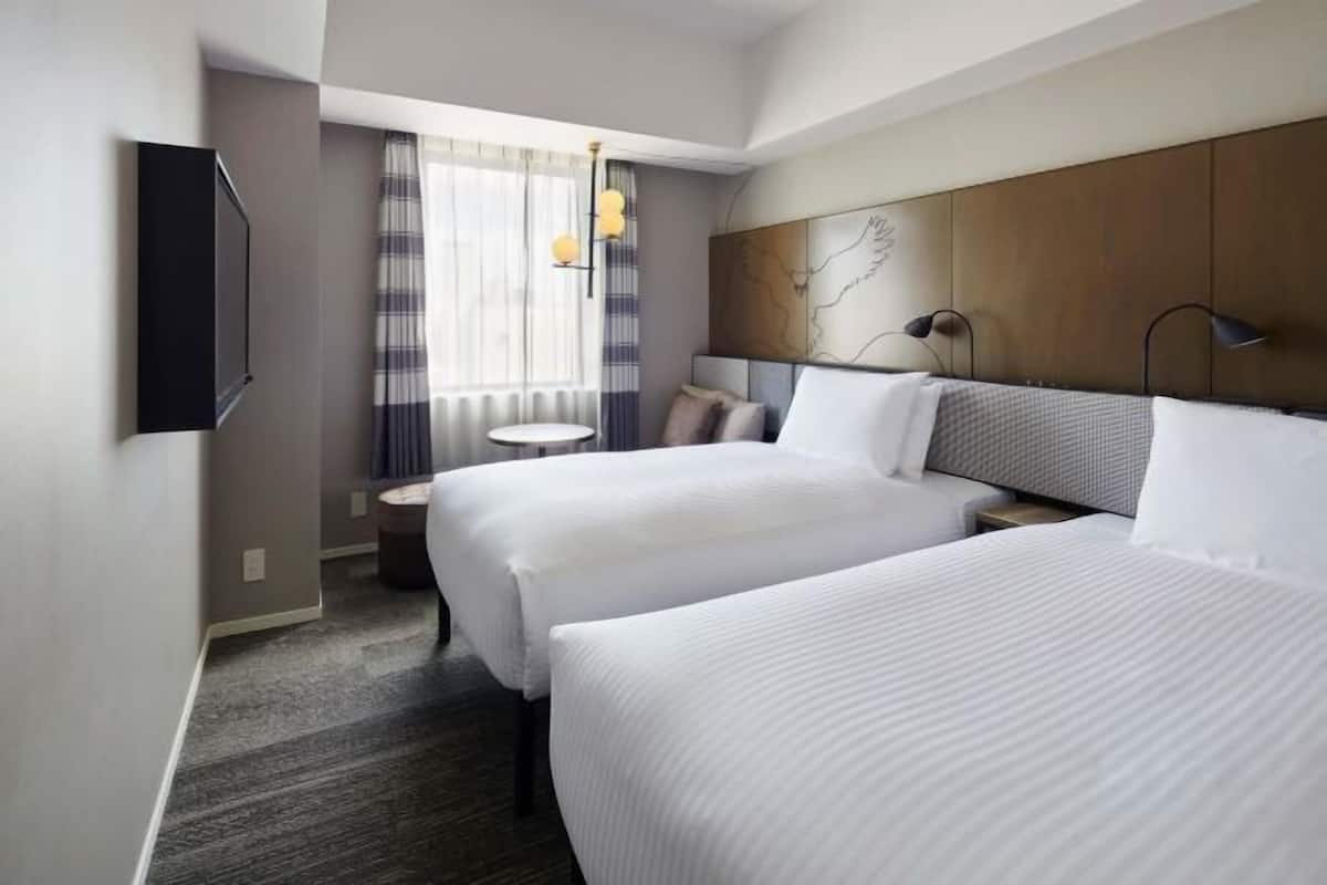 Cofres nos quartos, Wi-Fi de cortesia, roupa de cama