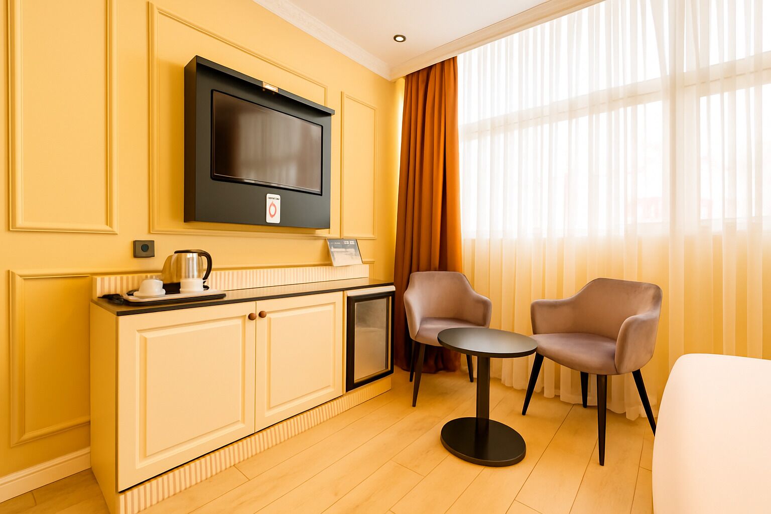 deluxe double room | living area | 82-inch lcd tv with digital channels, tv
