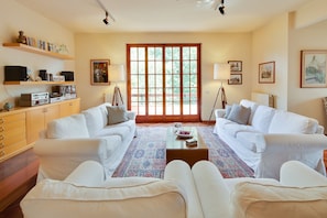 Cozy seating area with two sofas and a coffee table, perfect for conversation and relaxation.