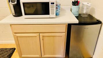 Fridge, microwave, coffee/tea maker, toaster