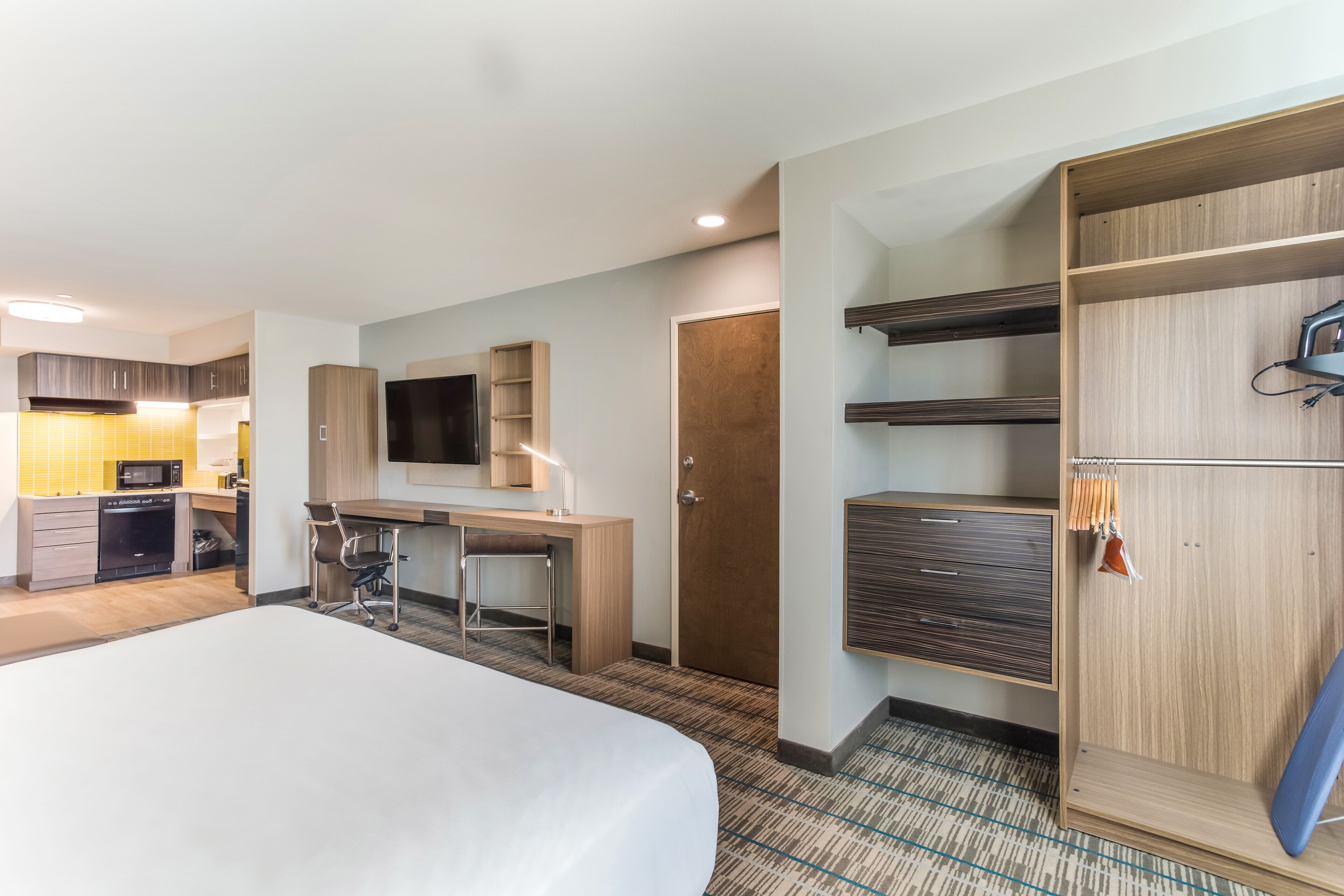 accessible suite, 1 king bed with sofa bed, non smoking | desk, laptop workspace, blackout curtains, iron/ironing board