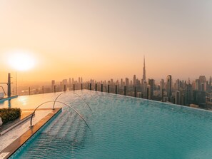 2 outdoor pools, open 9:00 AM to 7:00 PM, pool umbrellas, pool loungers - SLS Dubai Hotel & Residences (Dubai)
