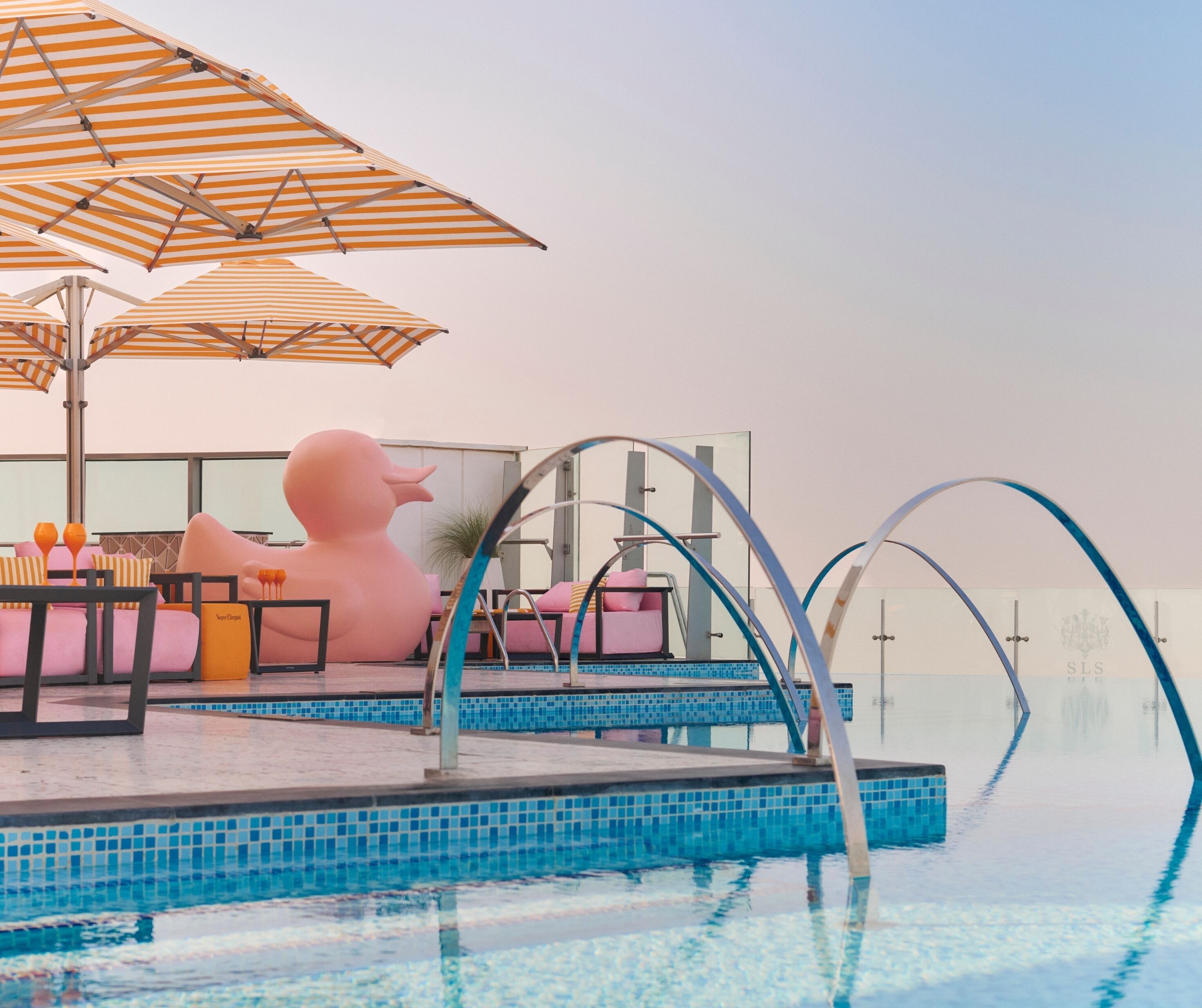 2 outdoor pools, open 9:00 AM to 7:00 PM, pool umbrellas, sun loungers