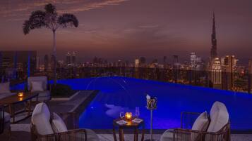 2 outdoor pools, open 9:00 AM to 7:00 PM, pool umbrellas, pool loungers