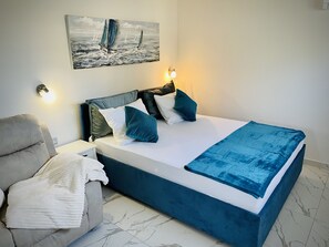 3 slaapkamers, een strijkplank/strijkijzer, wifi, beddengoed