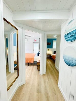 2 bedrooms, memory-foam beds, iron/ironing board, travel cot