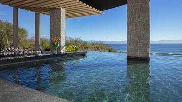 5 bars/lounges, swim-up bar, poolside bar, beach bar