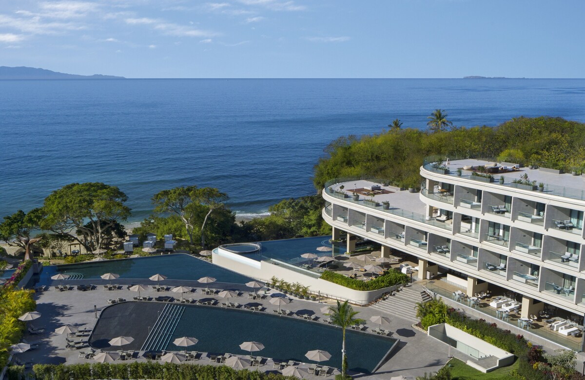 4 outdoor pools, open 8:00 AM to 8:00 PM, pool umbrellas, sun loungers