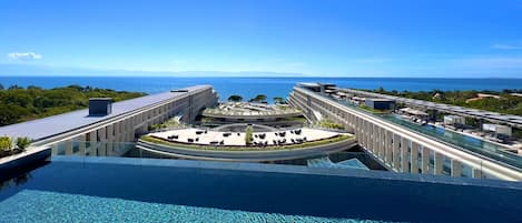 4 outdoor pools, open 8:00 AM to 8:00 PM, pool umbrellas, sun loungers