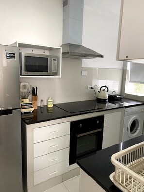 Microwave, oven - Apartment E in San Isidro, El Olivar Park - cleaning, and internet included (San Isidro)