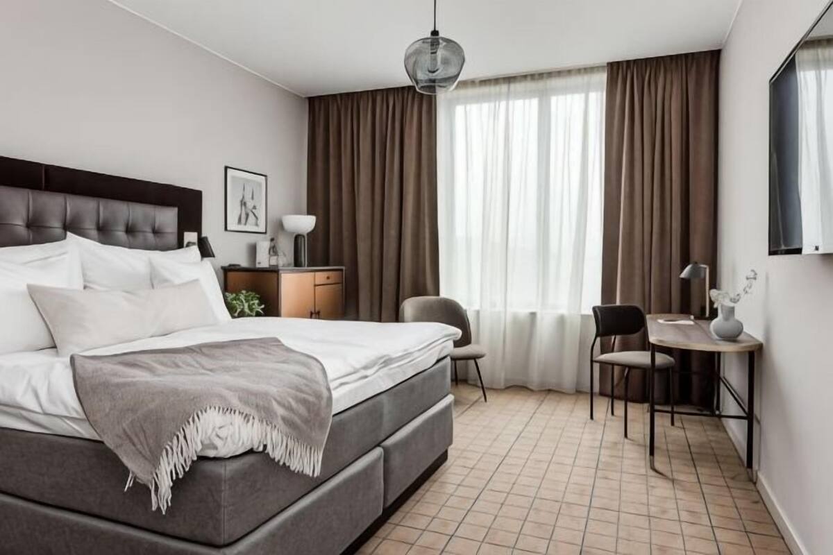 Down comforters, minibar, in-room safe, blackout drapes