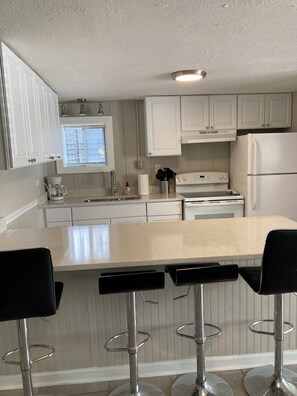 Fridge, microwave, oven, stovetop - 2nd Row 2 bed/1 bath Beach and Inlet property. Pet friendly with fee.  (Murrells Inlet)