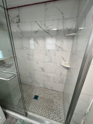 Combined shower/tub