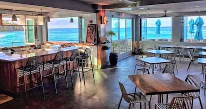 Magic Steps away & the Ocean Sings a Lullaby In Front of Your Ocean Front Suite