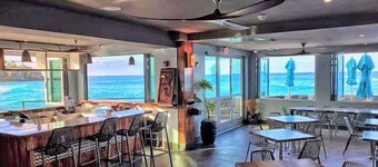 Magic Steps away & the Ocean Sings a Lullaby In Front of Your Ocean Front Suite