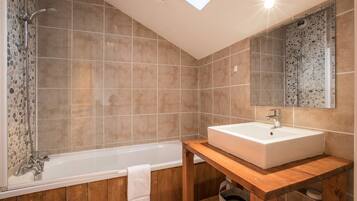 Combined shower/tub, hair dryer